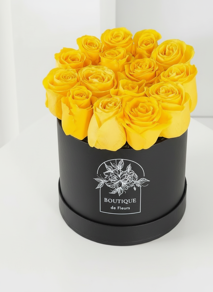 Golden Cheer luxury hatbox flower arrangement with fresh blooms, available for flower delivery in Lahore