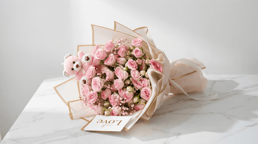 Blush Teddy Bloom Bouquet Side View – Pink Roses with Cuddly Teddy Bear | Boutique de Fleurs Lahore Pakistan