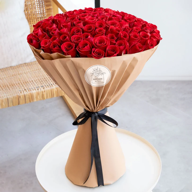 Bouquet of 100 fresh red roses for luxury flower delivery in Lahore