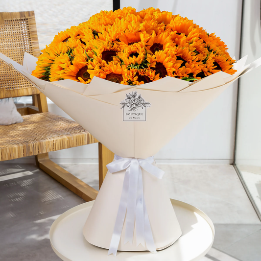 50 fresh sunflowers bouquet by Boutique De Fleurs available for same day flower delivery in Lahore