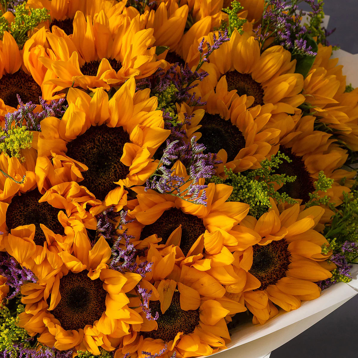 50 fresh sunflowers bouquet by Boutique De Fleurs available for same day flower delivery in Lahore