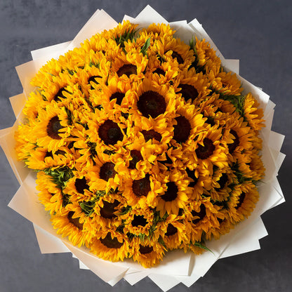 50 fresh sunflowers bouquet by Boutique De Fleurs available for same day flower delivery in Lahore
