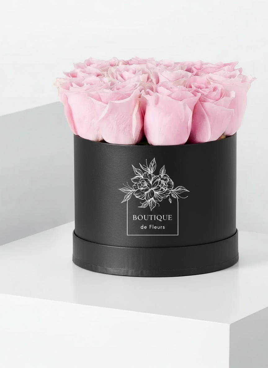Blush Éclat luxury hatbox with fresh pink roses, available for flower delivery in Lahore