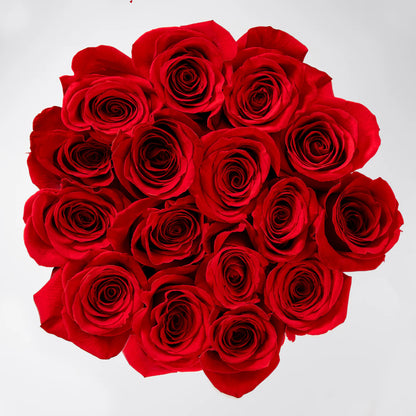 Crimson Amour luxury hatbox with fresh red roses, available for flower delivery in Lahore