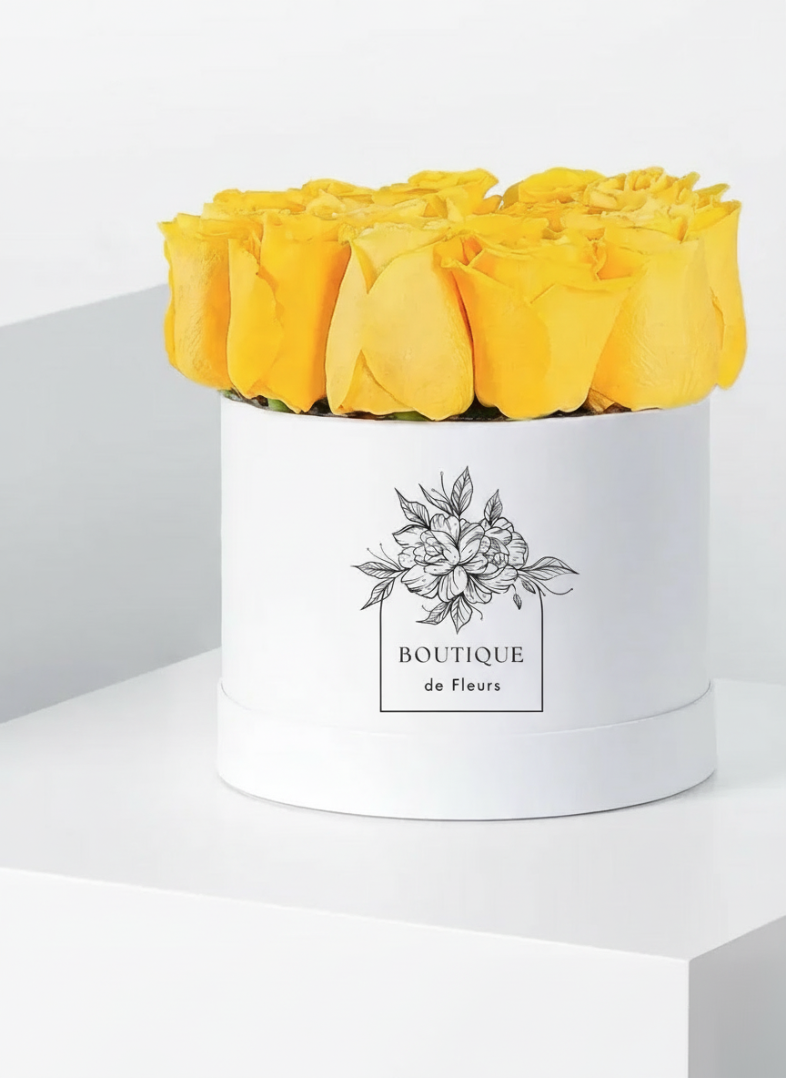 Golden Cheer luxury hatbox flower arrangement with fresh blooms, available for flower delivery in Lahore.