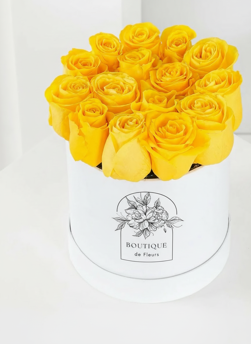 Golden Cheer luxury hatbox flower arrangement with fresh blooms, available for flower delivery in Lahore