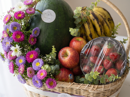 Fresh Harvest Fruit Basket Side View – Elegant Fruit & Flower Gift Basket | Boutique de Fleurs Lahore Pakistan