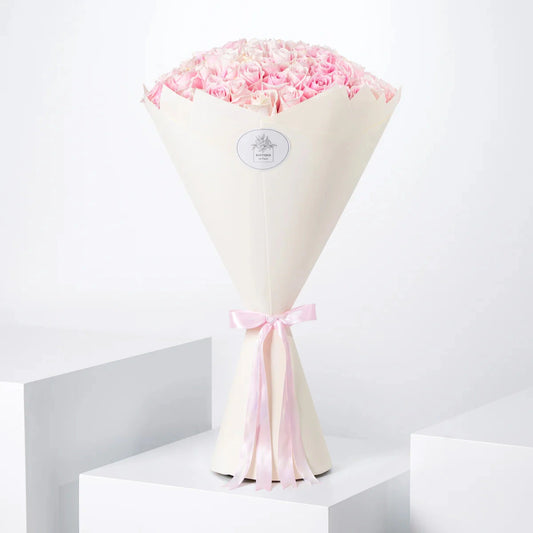 Bouquet of 50 fresh pink roses for luxury flower delivery in Lahore