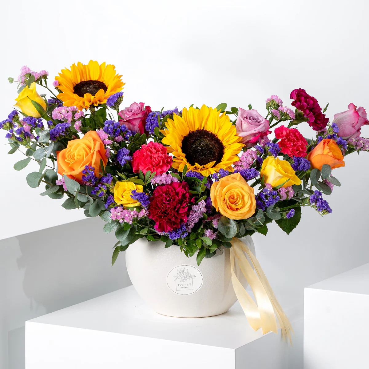 Vivid Vibrance Vase – Sunflowers Roses & Carnations in Bold Colors | Boutique de Fleurs Lahore Pakistan